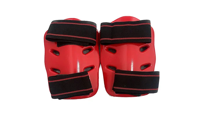 Detailed view of taekwondo protective gear padding and adjustable straps