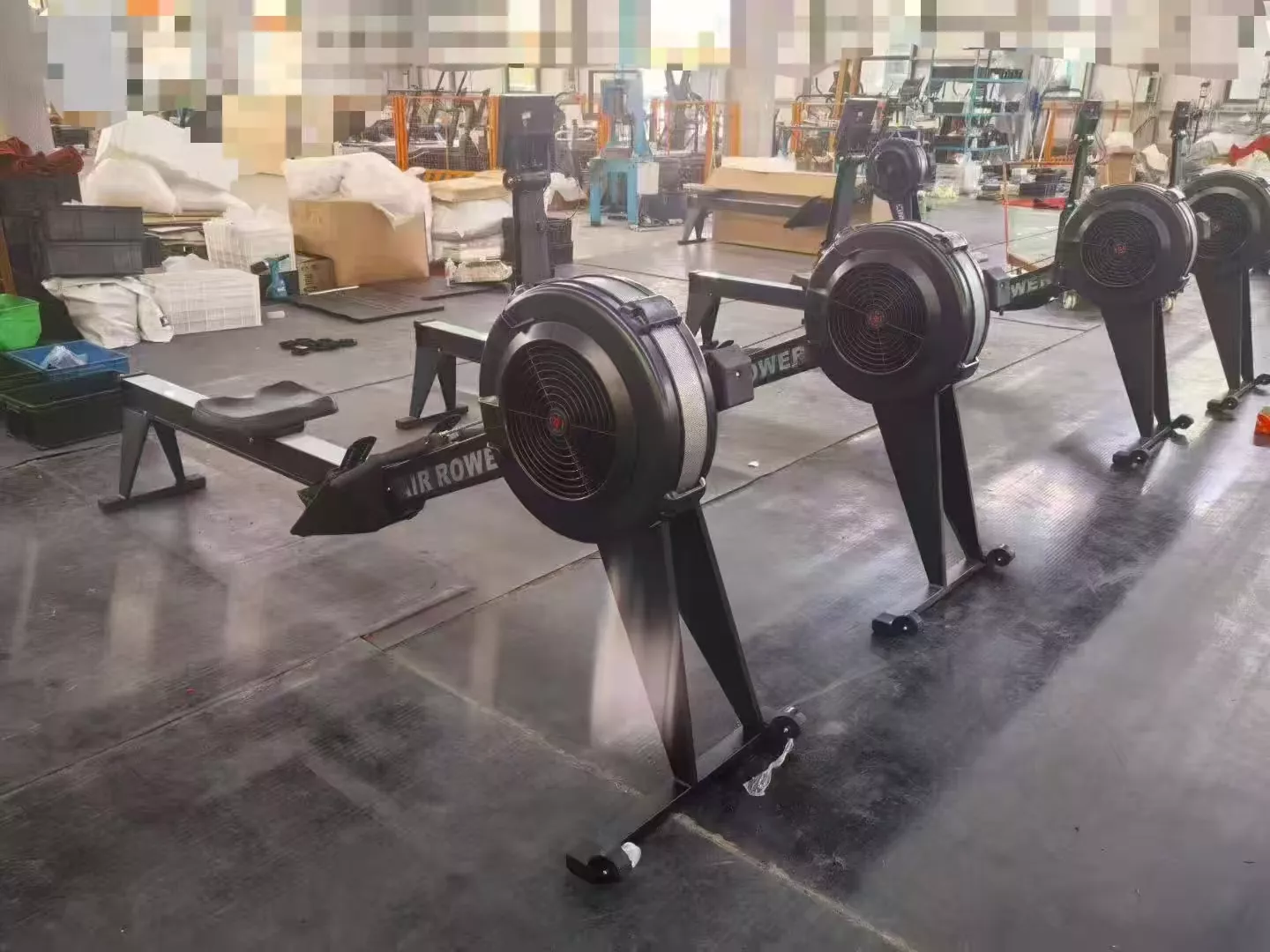 Side view of air rower showing reinforced steel frame and sliding rail